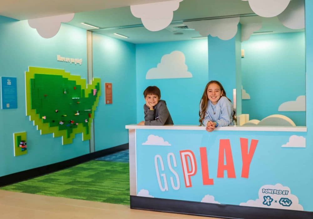 Two kids playing in the GSP play area.