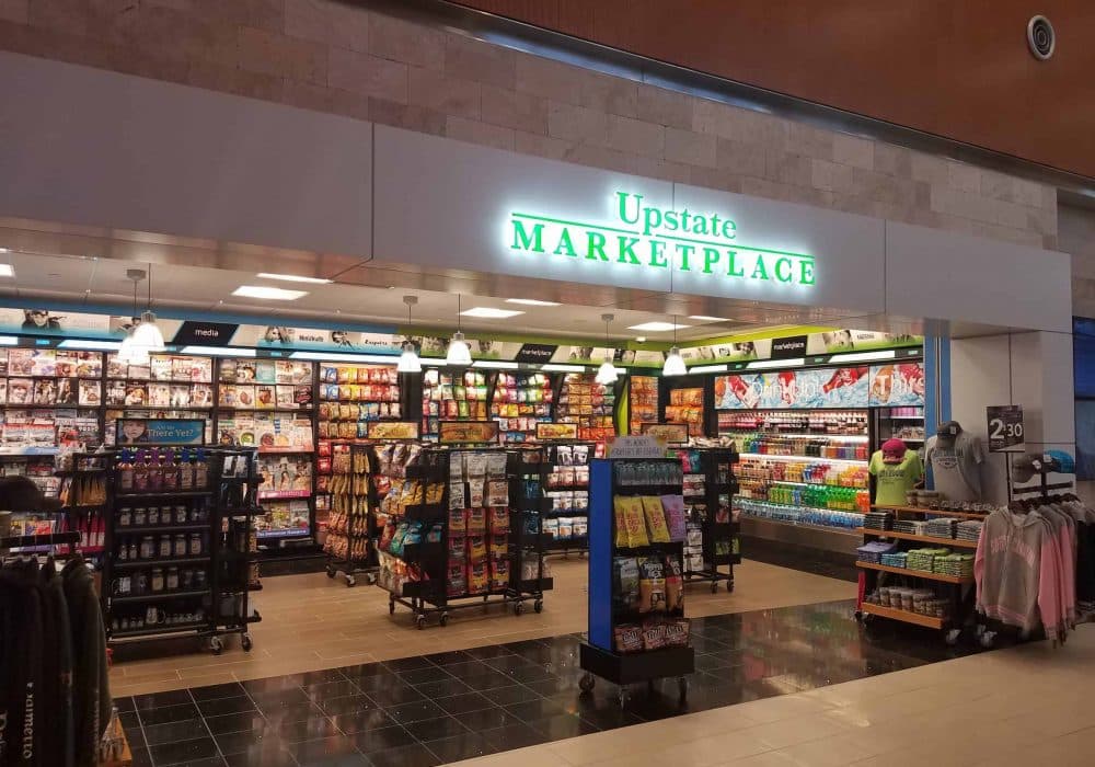 Exterior of Upstate Marketplace showing products available for purchase.